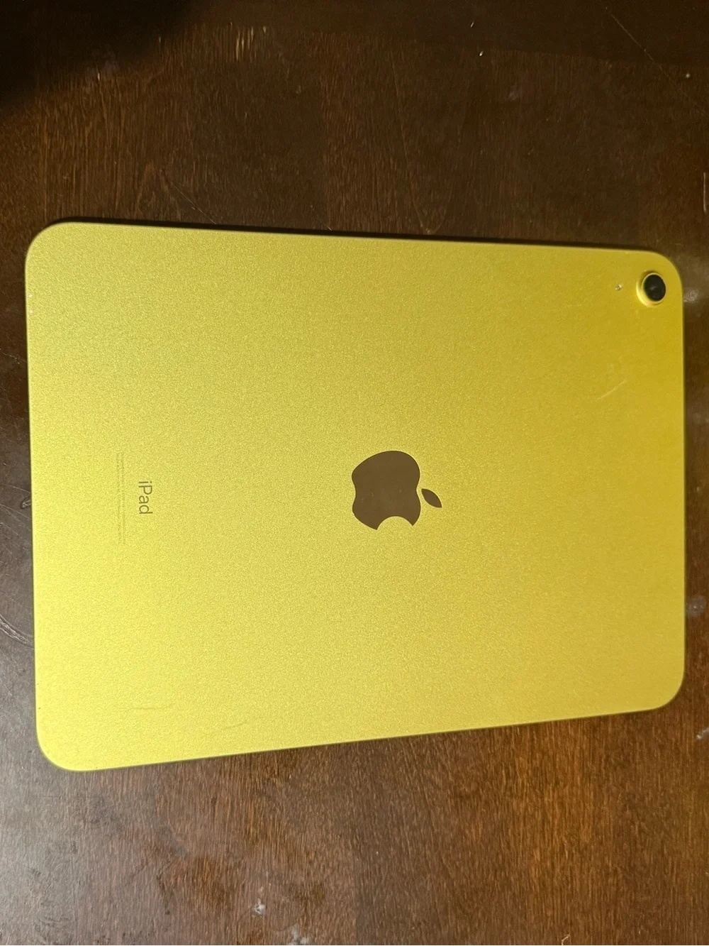 Yellow Apple iPad 10th Generation With Black Protective Case and White Stylus